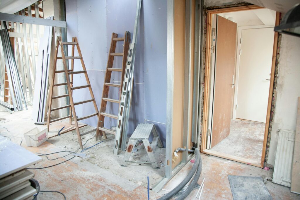 Drywall installation phase of a Long Island home renovation.