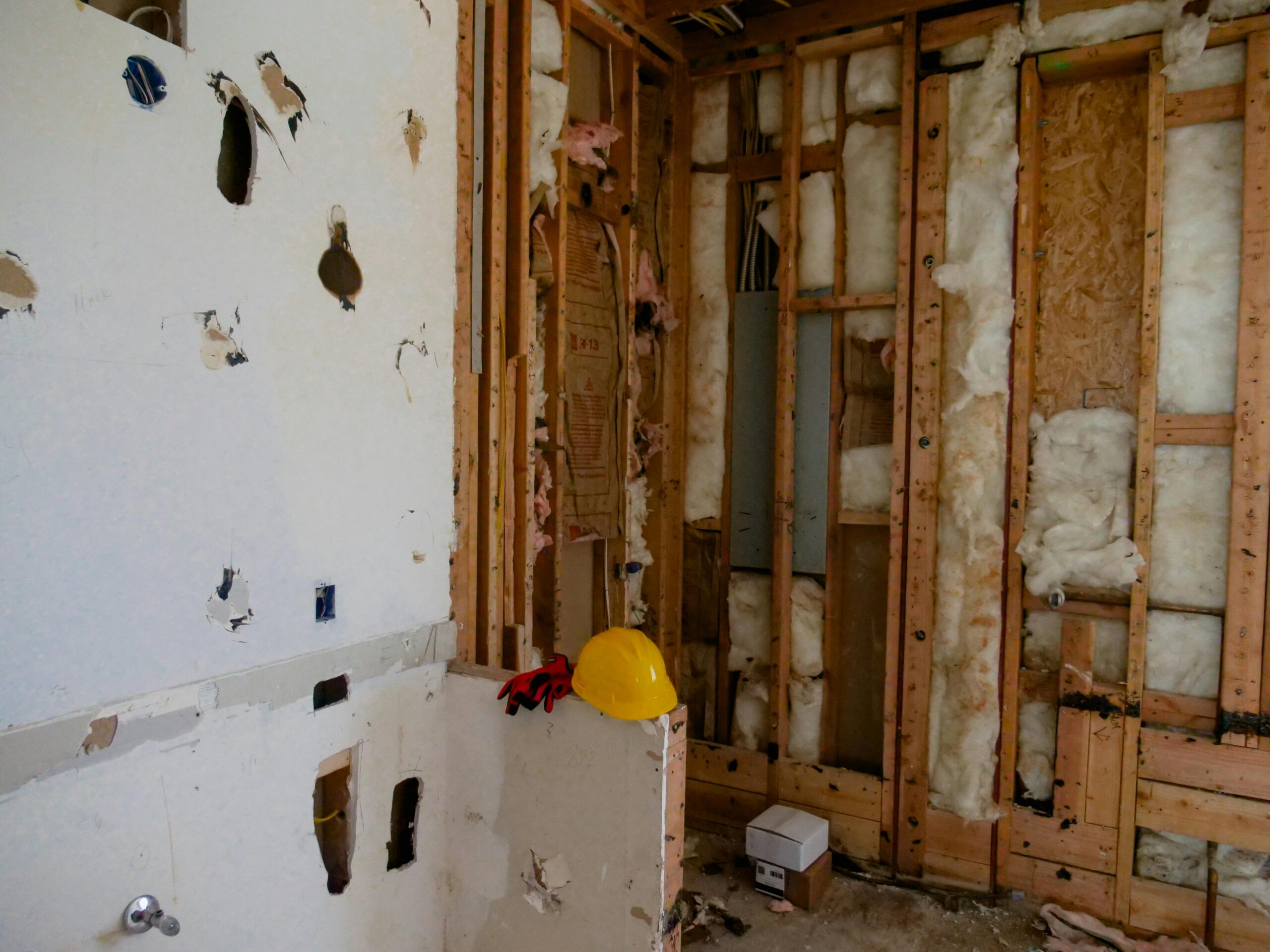 Exposed structural framing showing hidden issues during a Long Island renovation.
